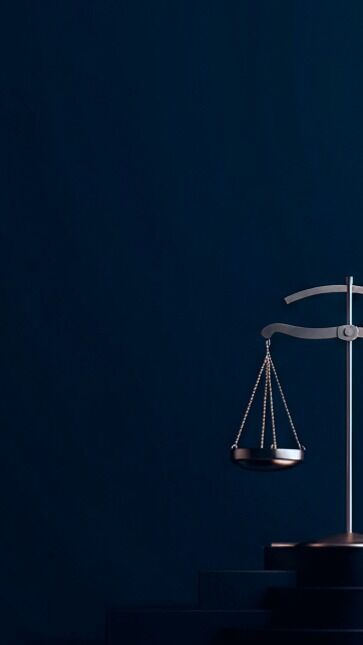 A statue of Lady Justice sits gracefully on a pedestal, symbolizing fairness and the rule of law.